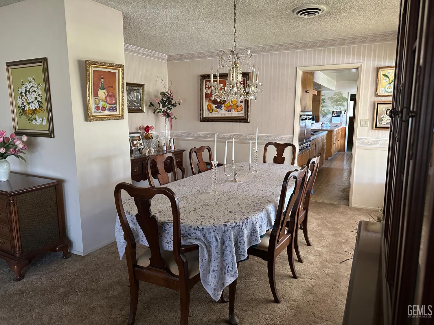 Undisclosed Address Wasco, CA 93280 - Photo 8 of 11 a view of a dining room with furniture