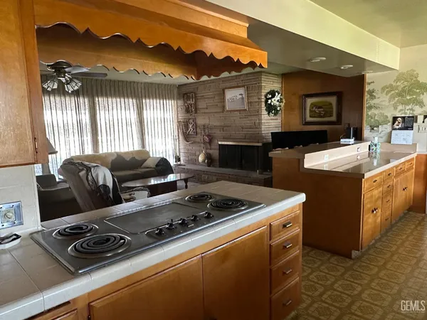 a kitchen with a stove and a microwave