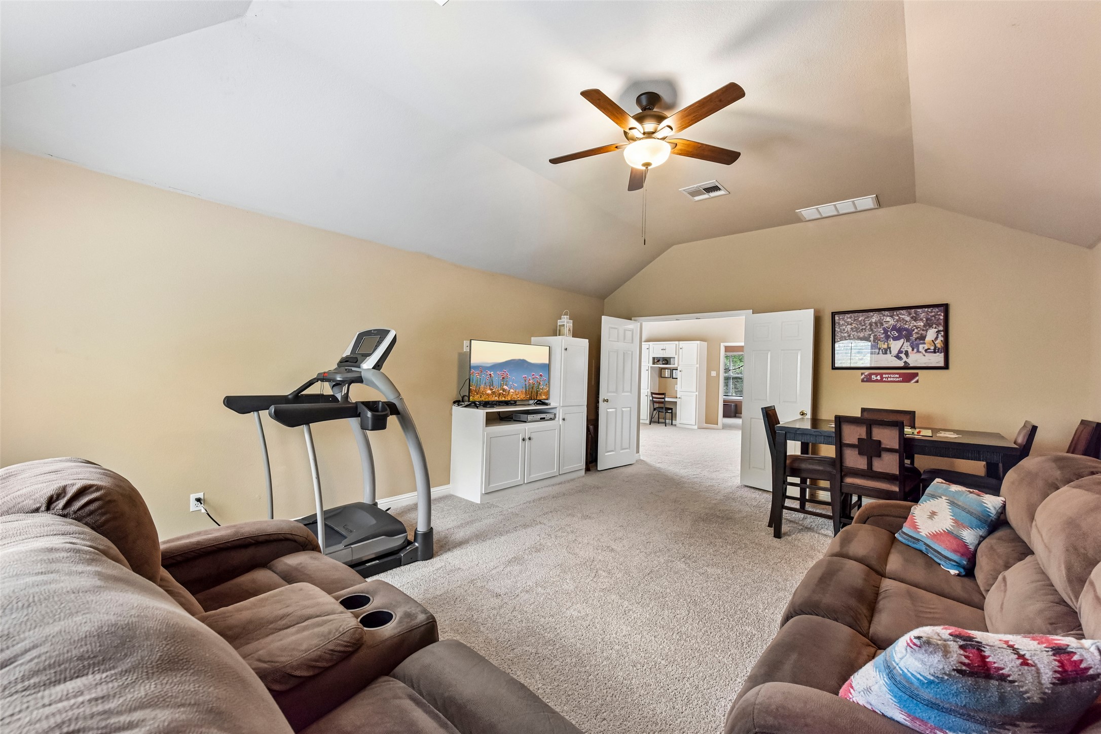 10216 Anahuac Trail Austin, TX 78747 - Photo 11 of 39 a living room with furniture and a ceiling fan