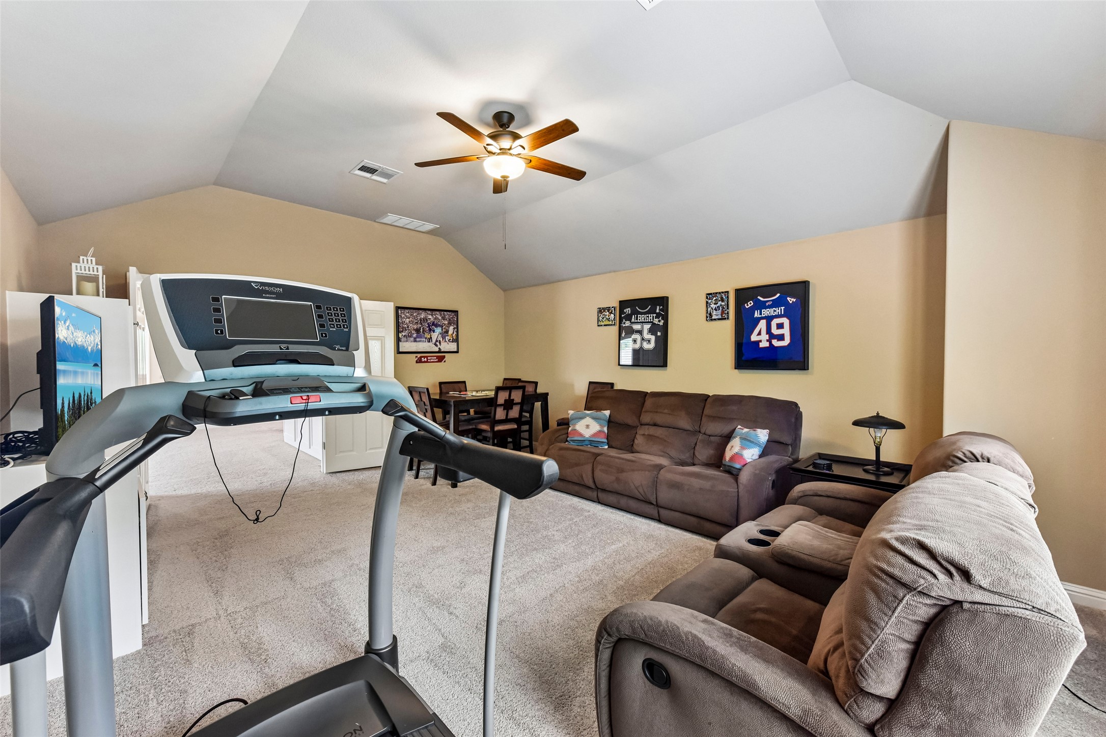 10216 Anahuac Trail Austin, TX 78747 - Photo 12 of 39 a living room with furniture a flat screen tv and a window