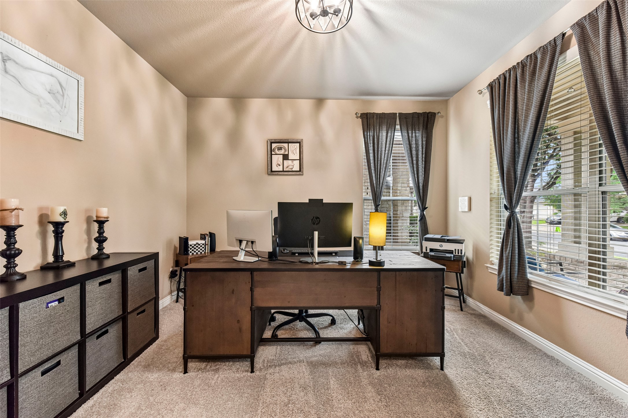 10216 Anahuac Trail Austin, TX 78747 - Photo 19 of 39 a view of a workspace with furniture and window