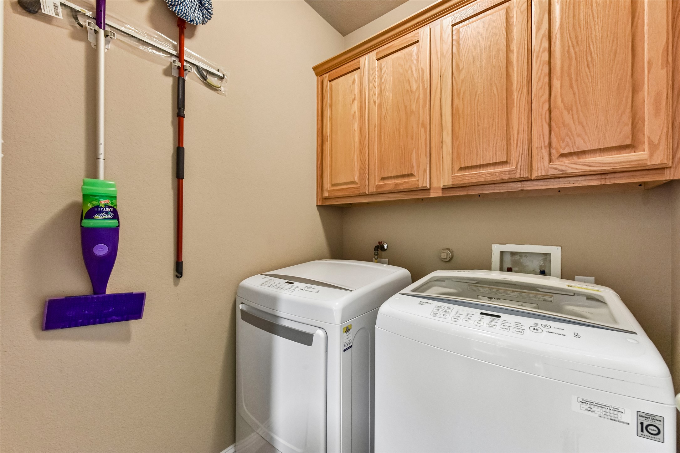 10216 Anahuac Trail Austin, TX 78747 - Photo 21 of 39 a utility room with dryer and washer