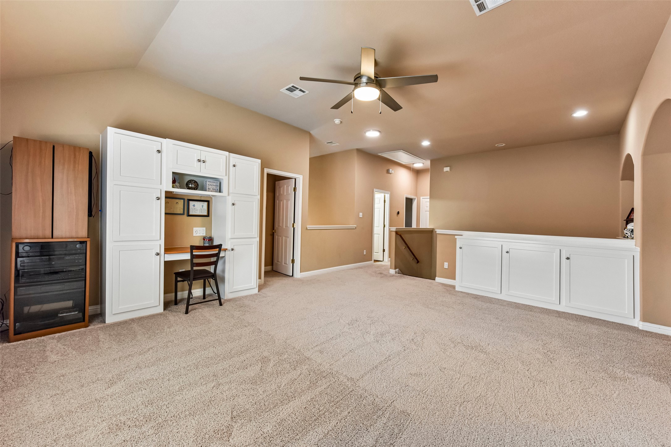 10216 Anahuac Trail Austin, TX 78747 - Photo 30 of 39 a view of a livingroom with a furniture and a ceiling fan