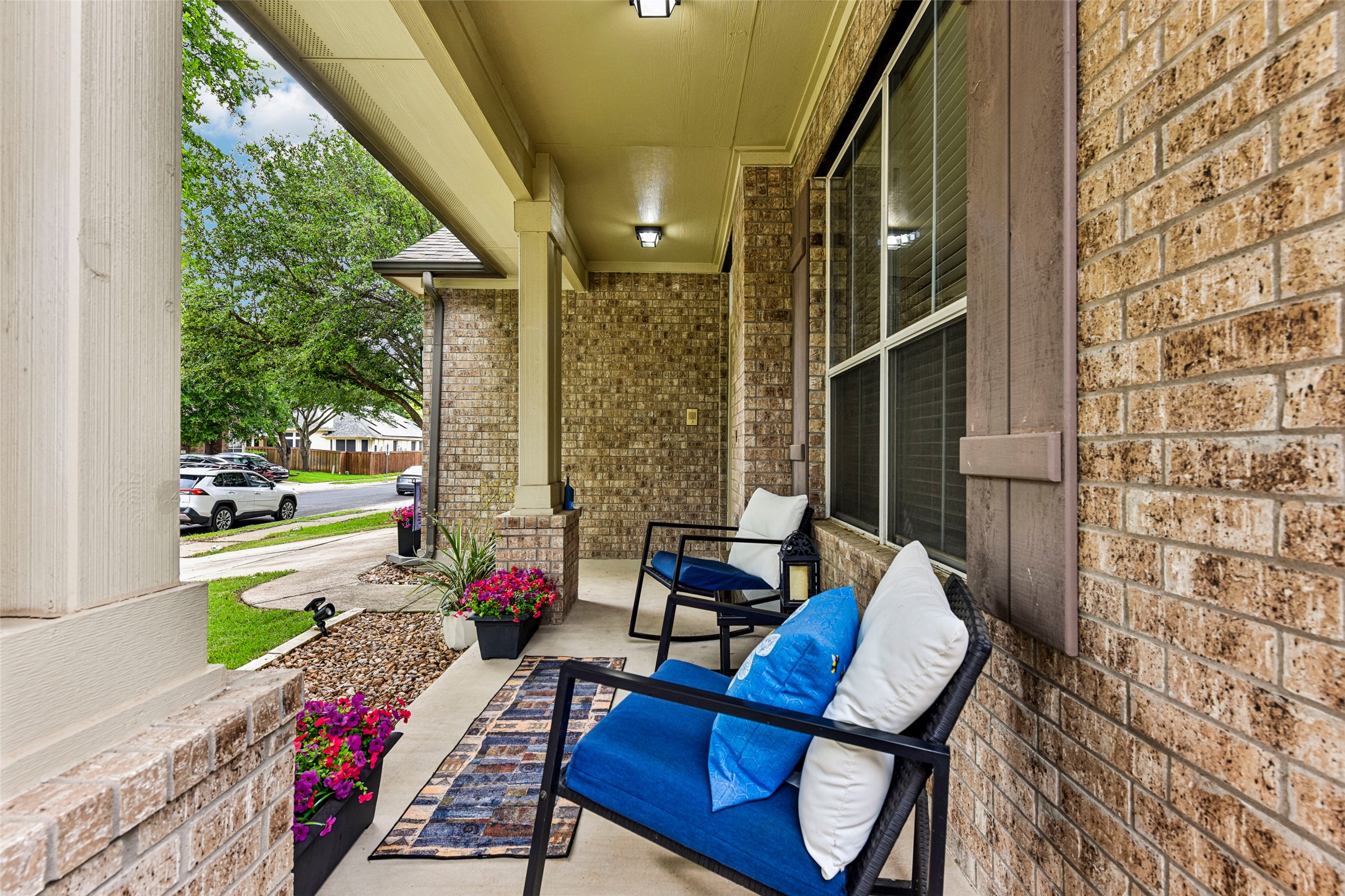 10216 Anahuac Trail Austin, TX 78747 - Photo 3 of 39 a view of balcony with wooden floor and outdoor seating