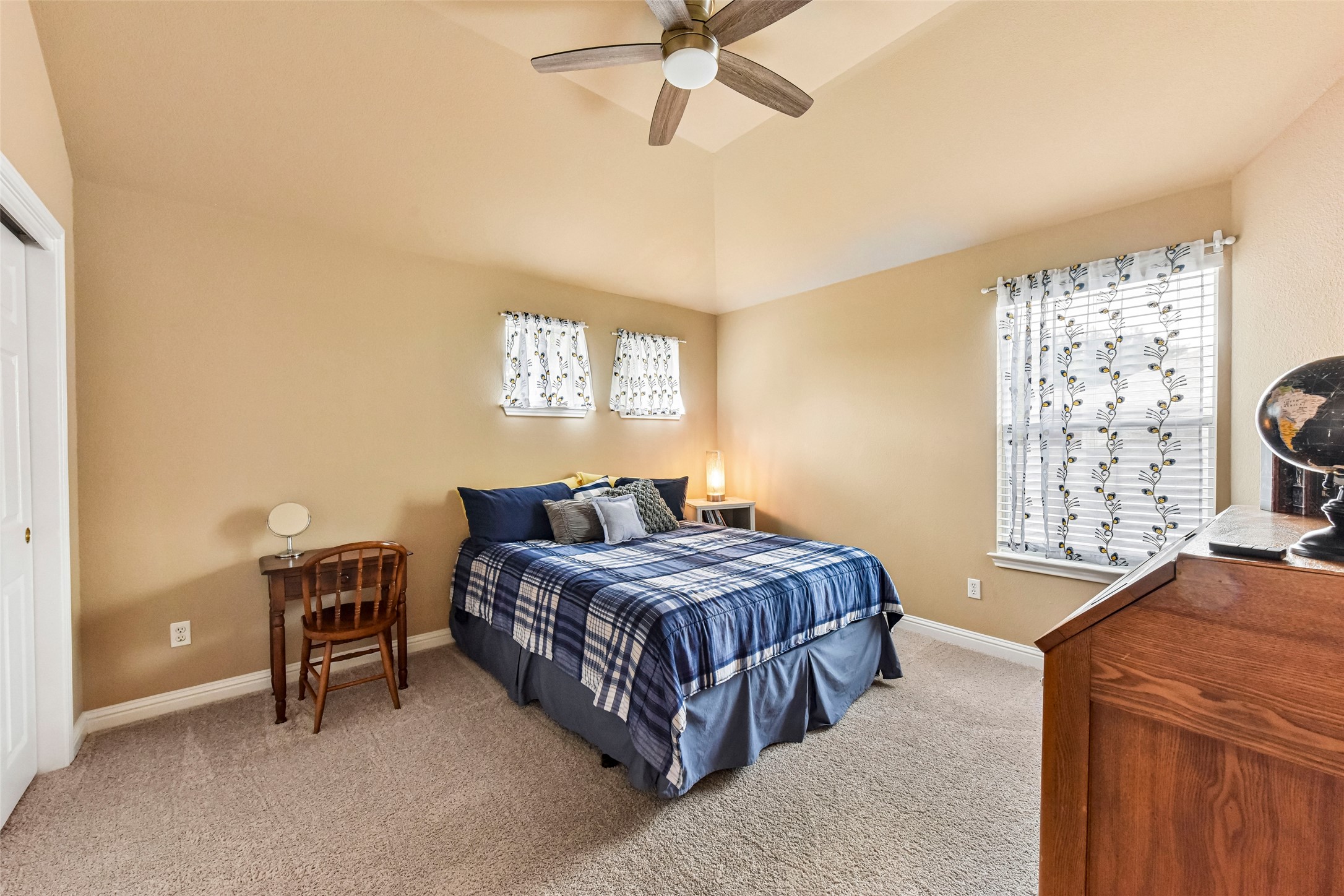 10216 Anahuac Trail Austin, TX 78747 - Photo 34 of 39 a bedroom with a bed and a window