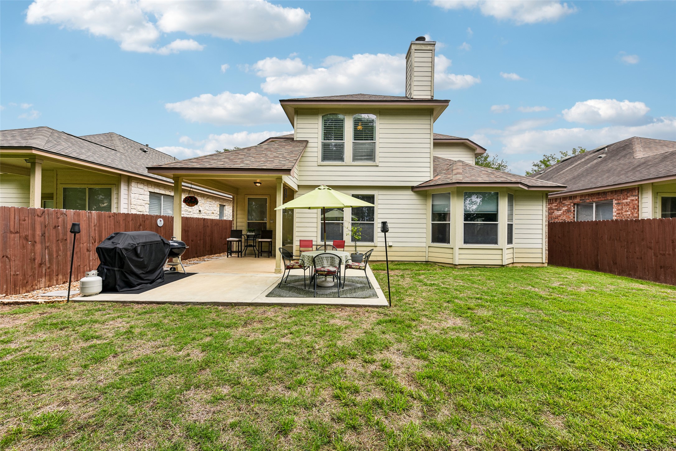 10216 Anahuac Trail Austin, TX 78747 - Photo 35 of 39 a front view of a house with a yard