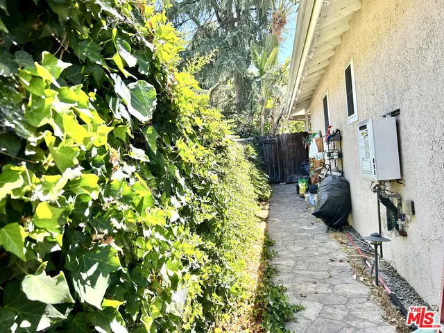 a backyard of a house with lots of green space