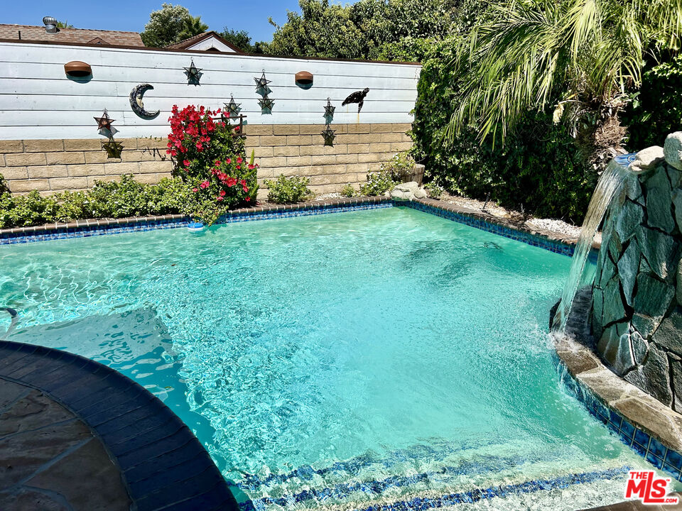 10205 Fairgrove Avenue Tujunga, CA 91042 - Photo 4 of 21 a view of a house with a yard