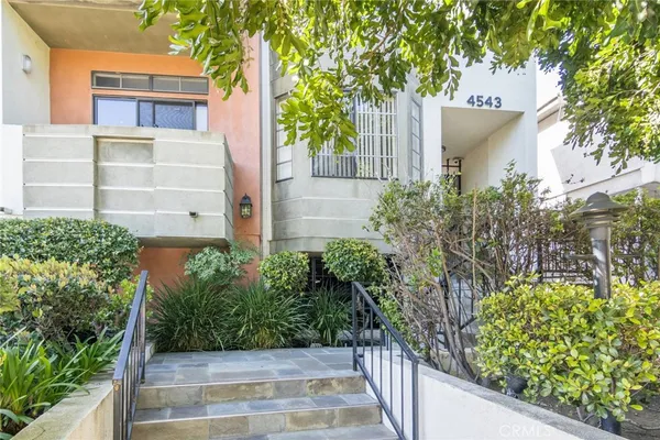 a view of a back yard of the house