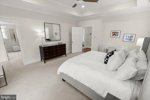 a bedroom with a bed and a closet