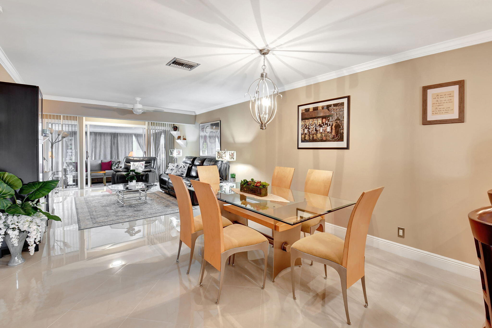 2721 Southwest 15th Street, Unit 203 Delray Beach, FL 33445 - Photo 13 of 55 a view of a dining room with furniture