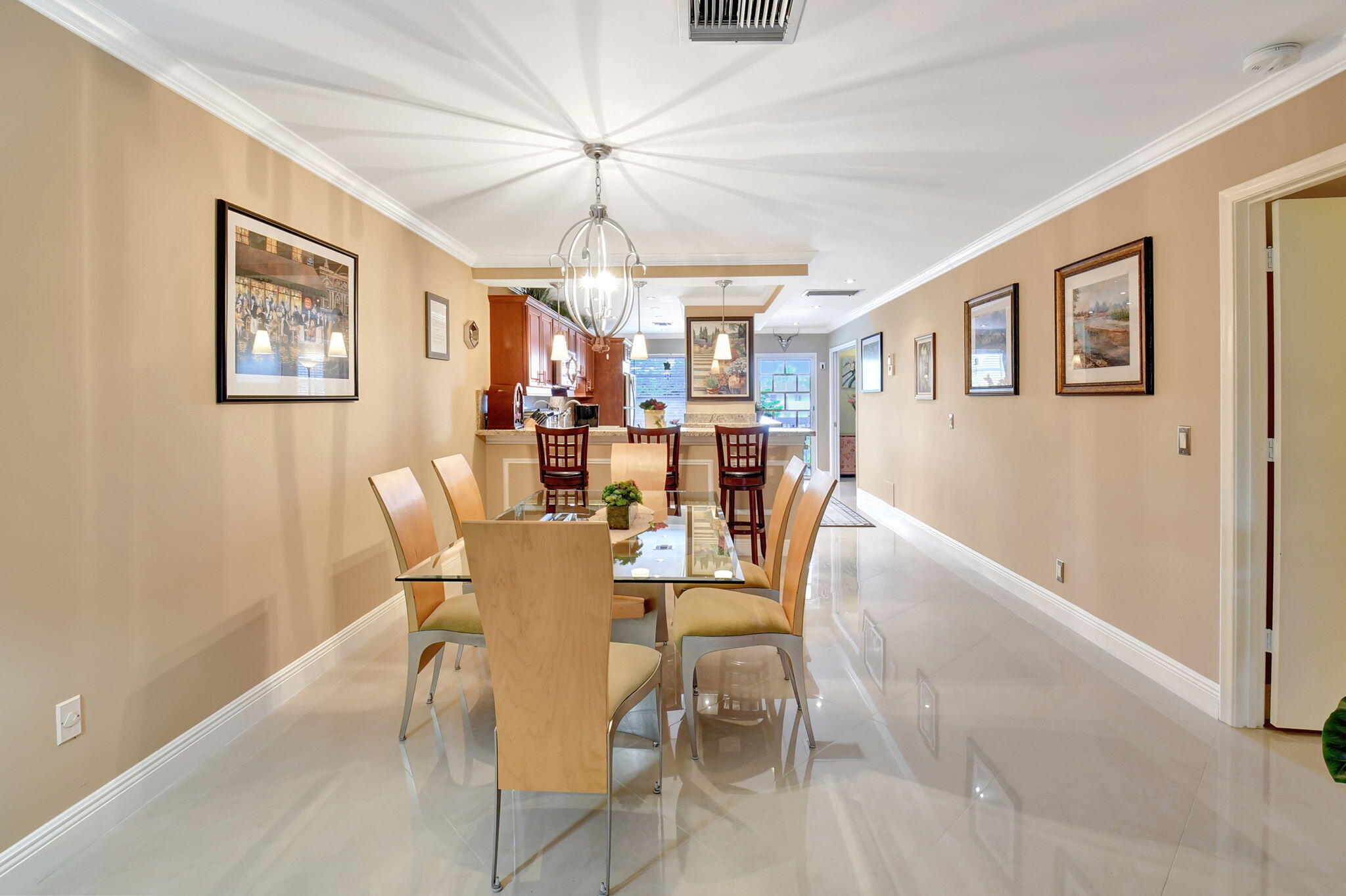 2721 Southwest 15th Street, Unit 203 Delray Beach, FL 33445 - Photo 16 of 55 a view of a dining room with furniture