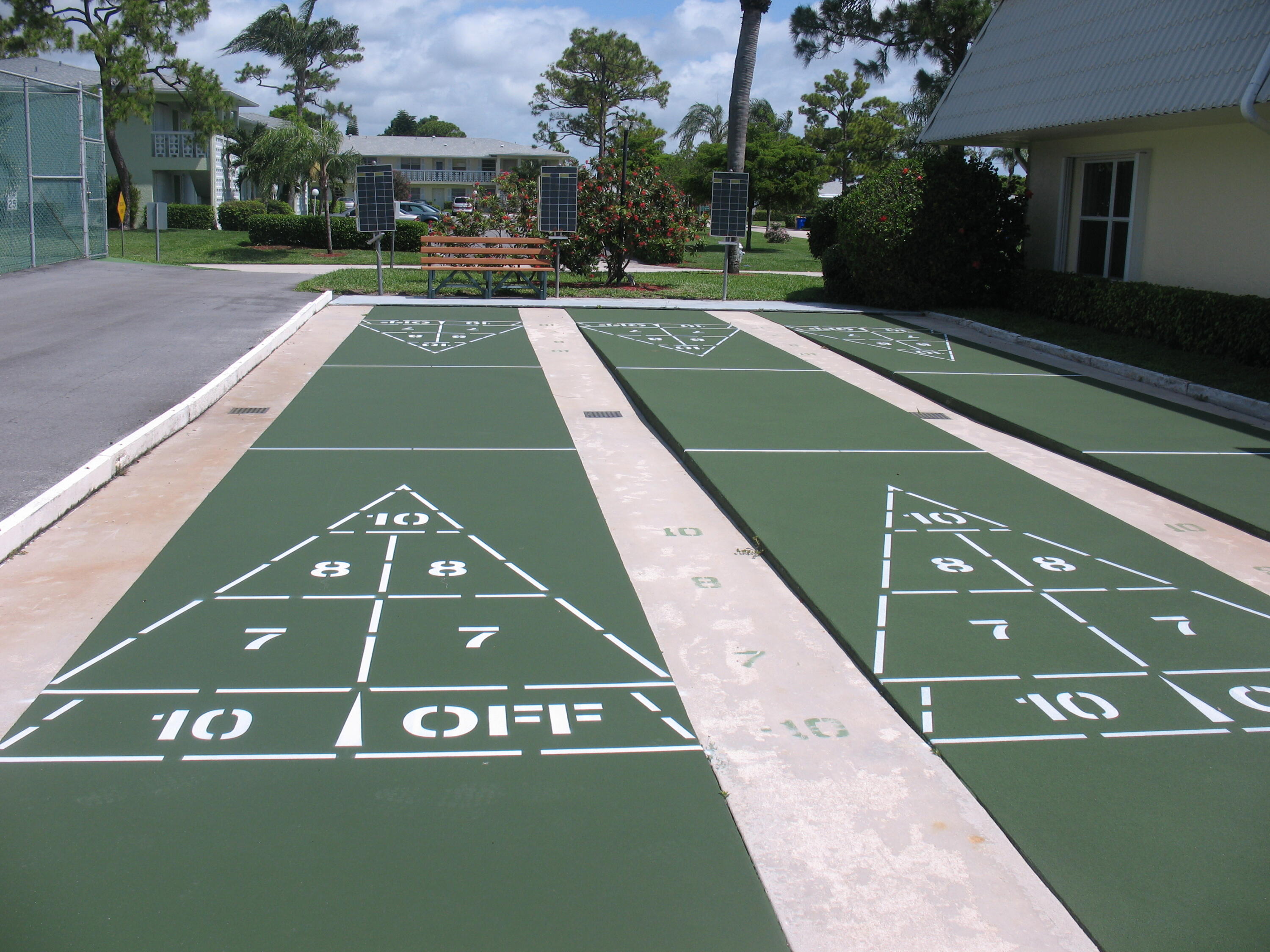 2721 Southwest 15th Street, Unit 203 Delray Beach, FL 33445 - Photo 45 of 55 a view of a tennis court
