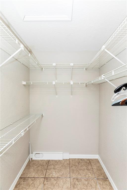 5701 Mossberg Drive New Port Richey, FL 34655 - Photo 22 of 58 a view of a room with racks on the wall