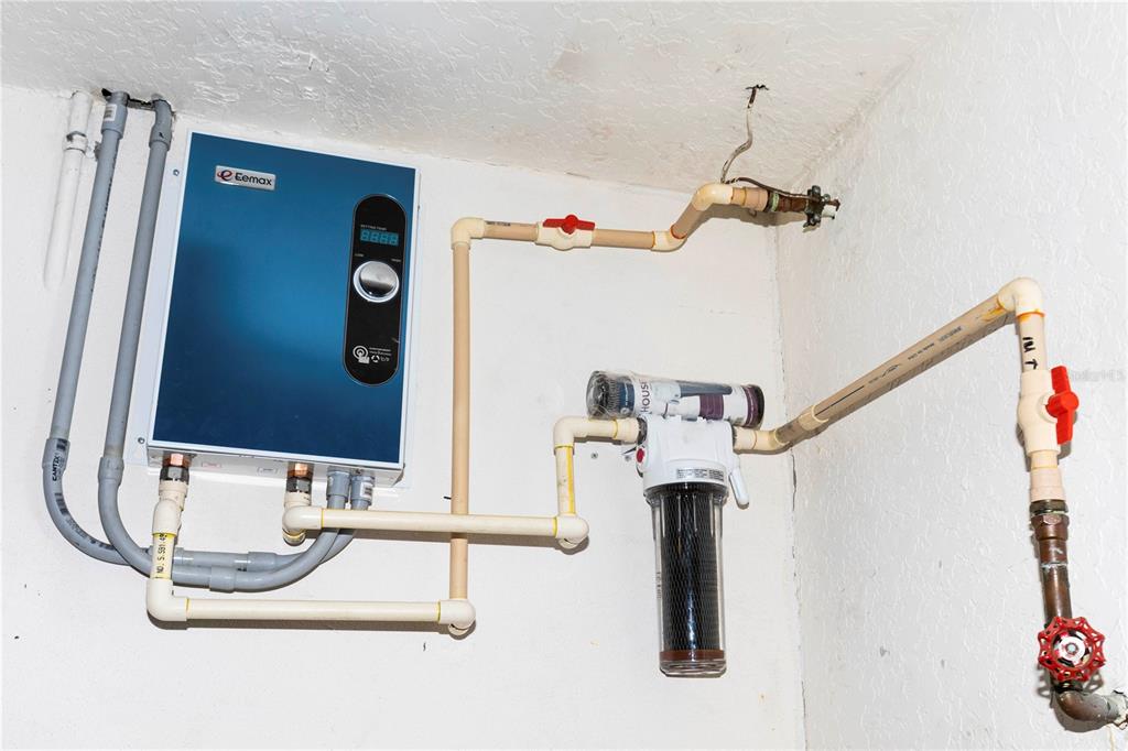 5701 Mossberg Drive New Port Richey, FL 34655 - Photo 36 of 58 a bathroom with a sink and mirror