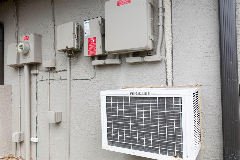 5701 Mossberg Drive New Port Richey, FL 34655 - Photo 41 of 58 a utility room with dryer and washer