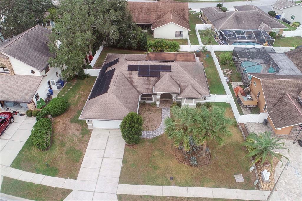 5701 Mossberg Drive New Port Richey, FL 34655 - Photo 46 of 58 an aerial view of a house with garden space and a street view