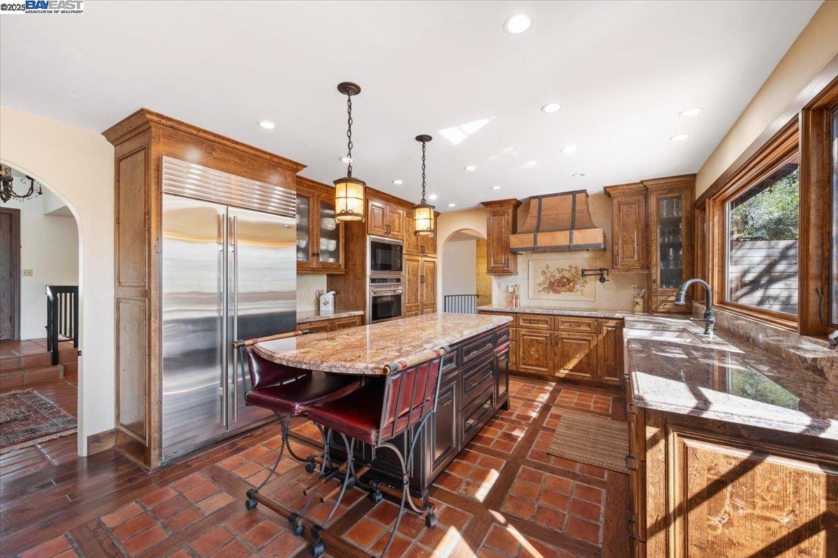 298 St Andrews Way Lompoc, CA 93436 - Photo 12 of 56 a very nice looking dining room with a large window and stainless steel appliances