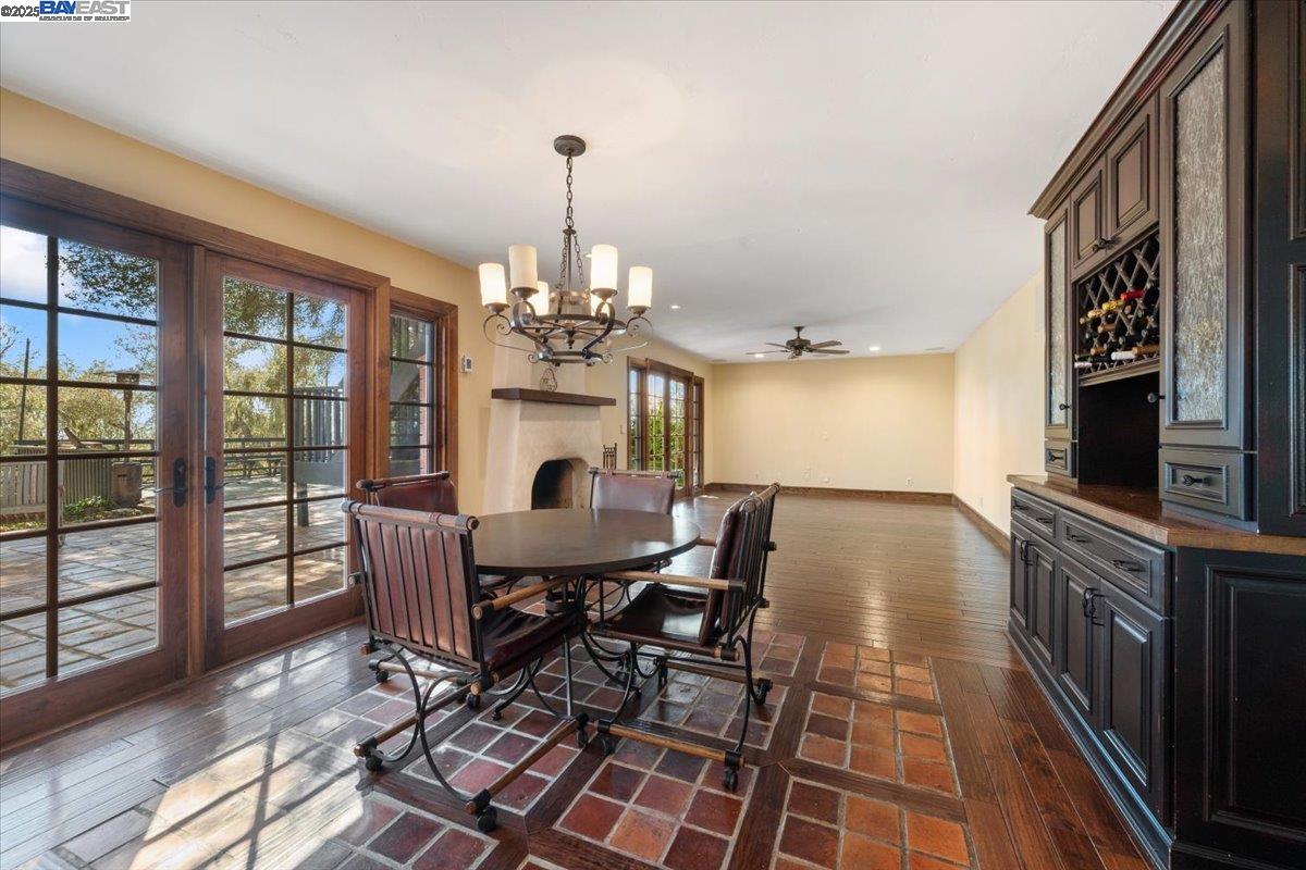 298 St Andrews Way Lompoc, CA 93436 - Photo 16 of 56 a view of a dining room with furniture window and wooden floor
