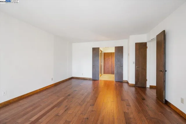 a view of balcony with wooden floor