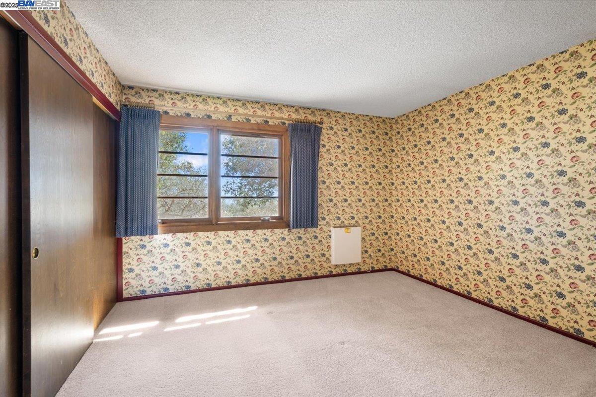 298 St Andrews Way Lompoc, CA 93436 - Photo 27 of 56 a view of wooden floor and windows in a room