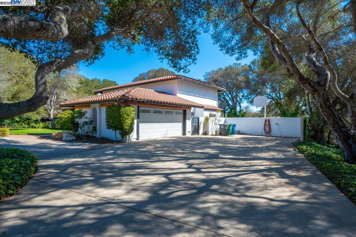 298 St Andrews Way Lompoc, CA 93436 - Photo 31 of 56 a view of a house with a yard and tree s