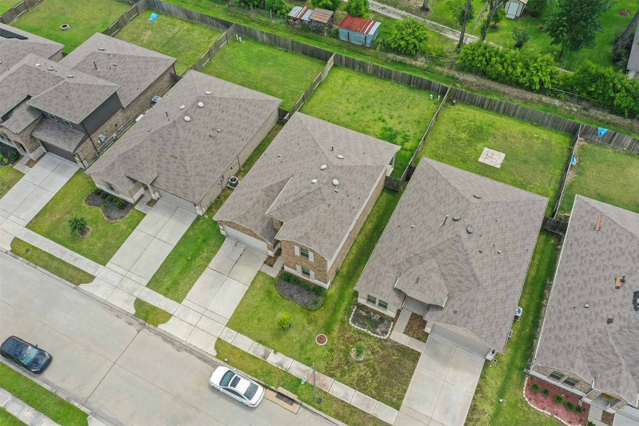 23711 Blodgett Peak Trail Spring, TX 77373 - Photo 23 of 32 an aerial view of a house with a garden and plants