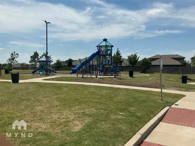 a view of a house with a park