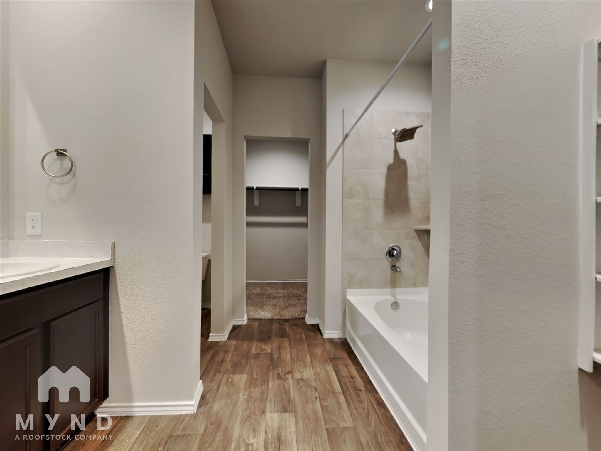 23711 Blodgett Peak Trail Spring, TX 77373 - Photo 10 of 32 a bathroom with a bathtub and a sink