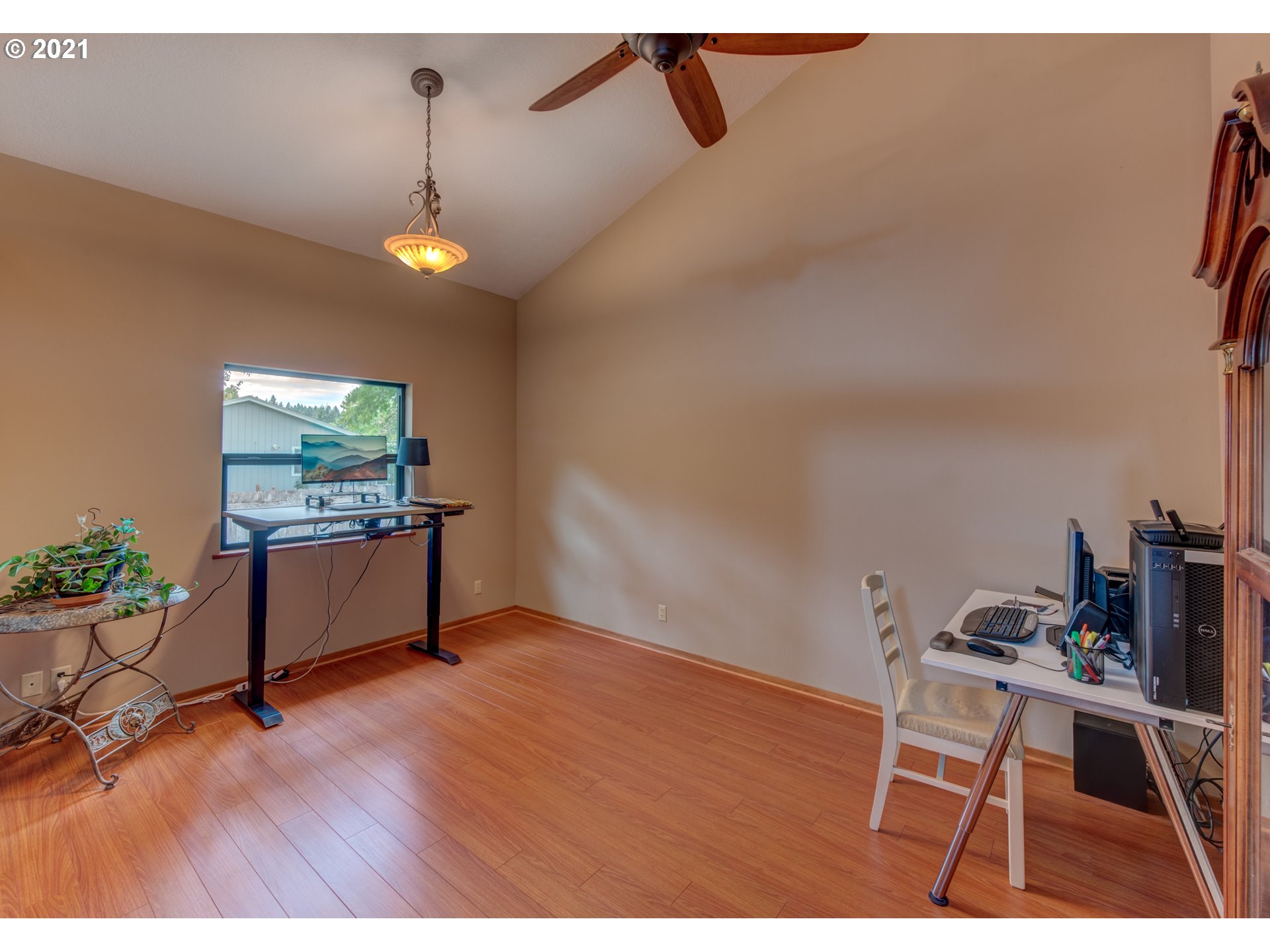 372 South 57th Place Springfield, OR 97478 - Photo 23 of 29 a room with furniture and a wooden floor