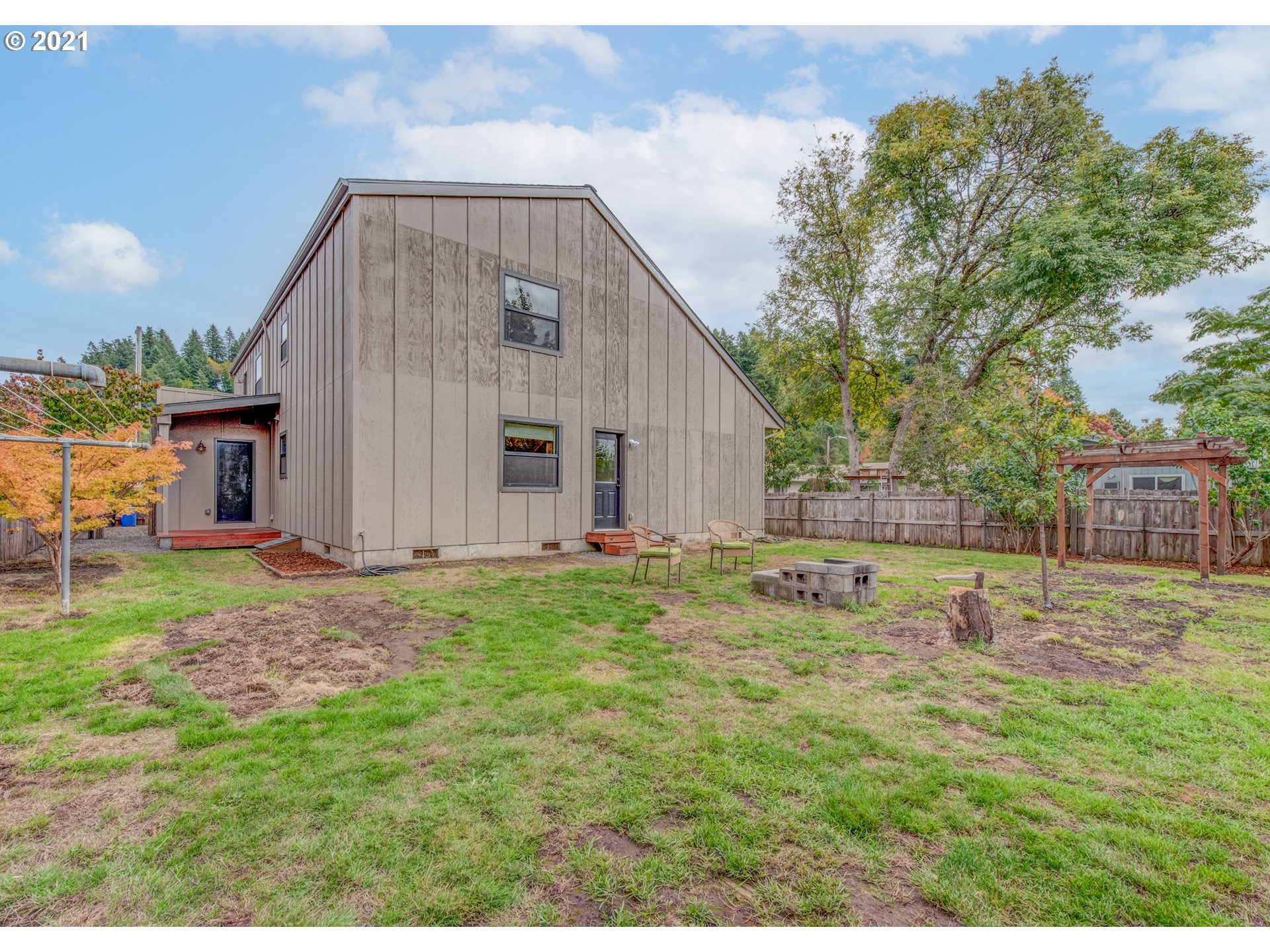 372 South 57th Place Springfield, OR 97478 - Photo 24 of 29 a view of a backyard with a garden and plants