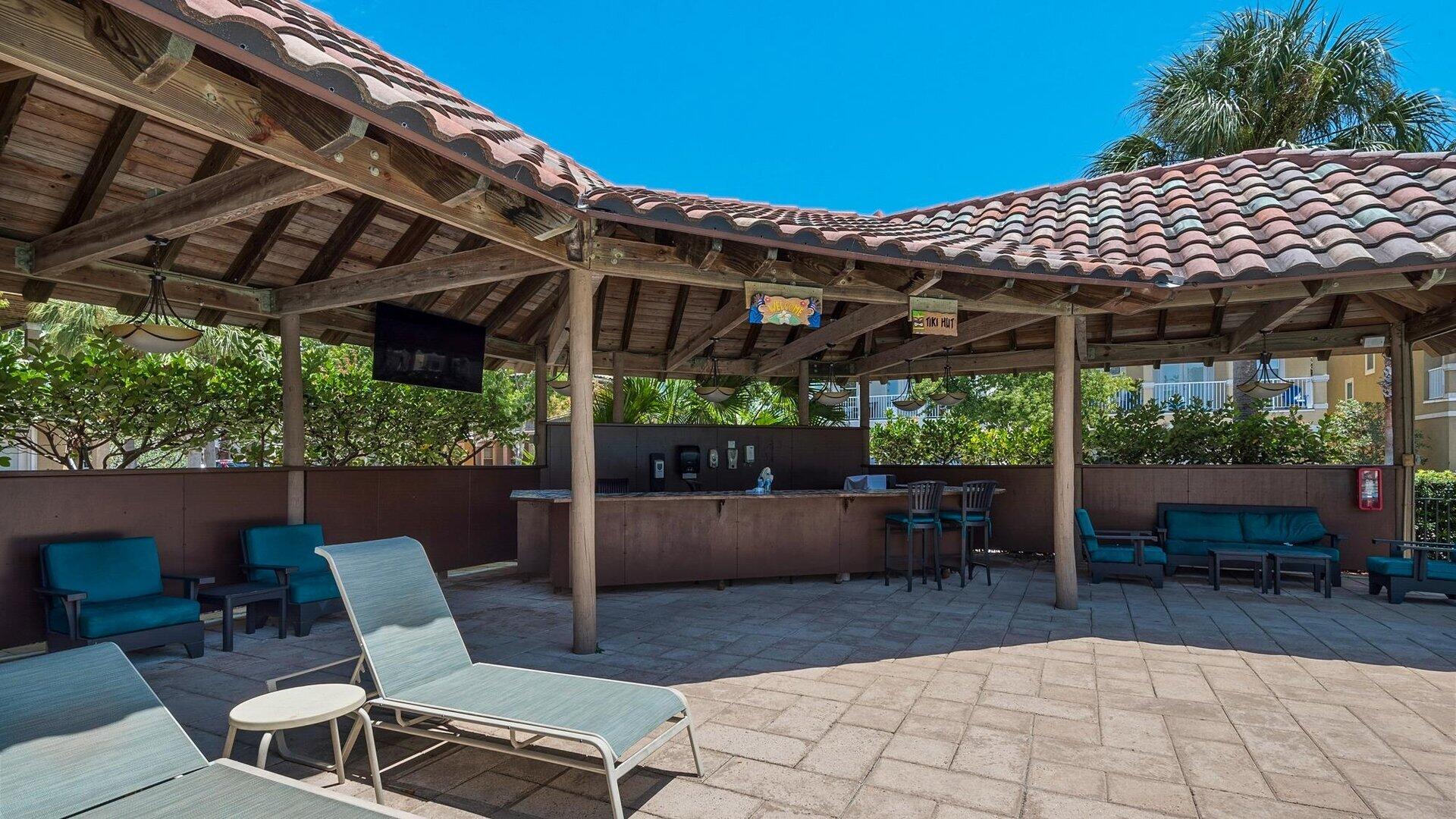 222 Kono Way Destin, FL 32541 - Photo 29 of 36 a patio with a table and chairs