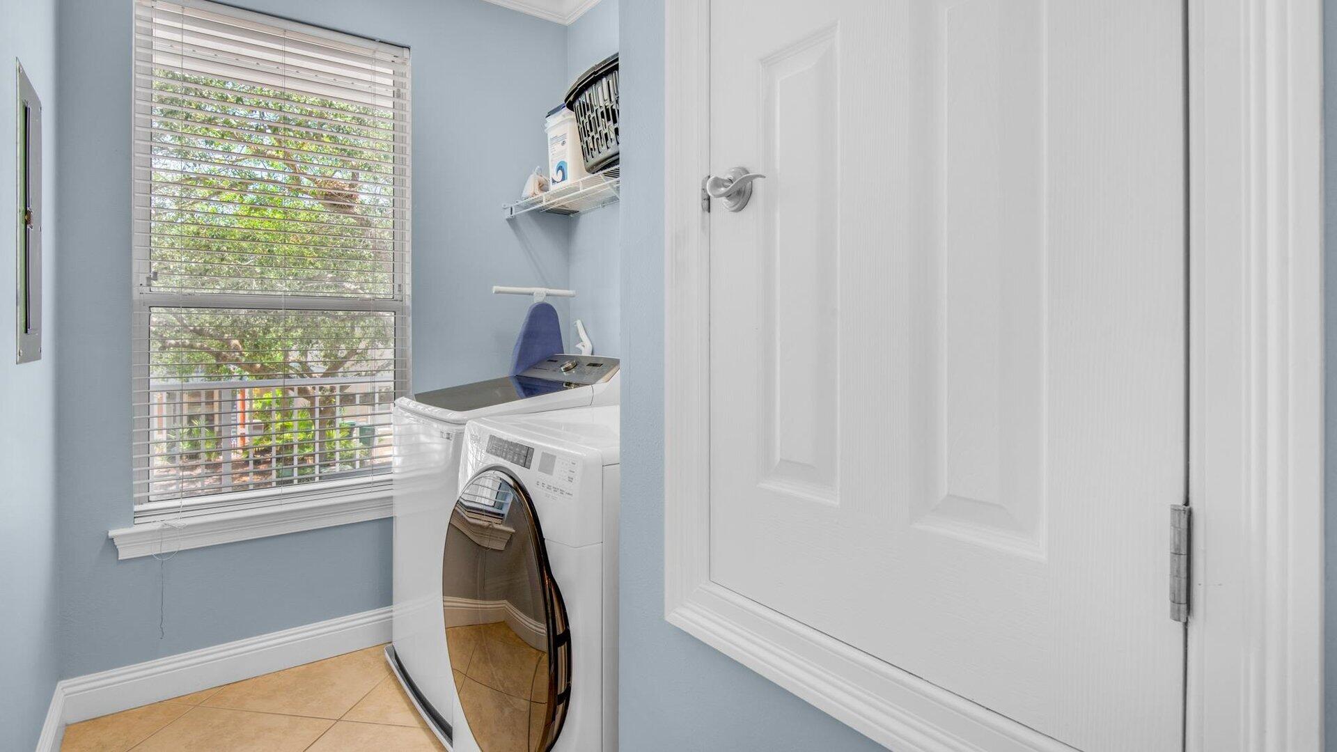 222 Kono Way Destin, FL 32541 - Photo 30 of 36 a view of a bedroom with washer and dryer