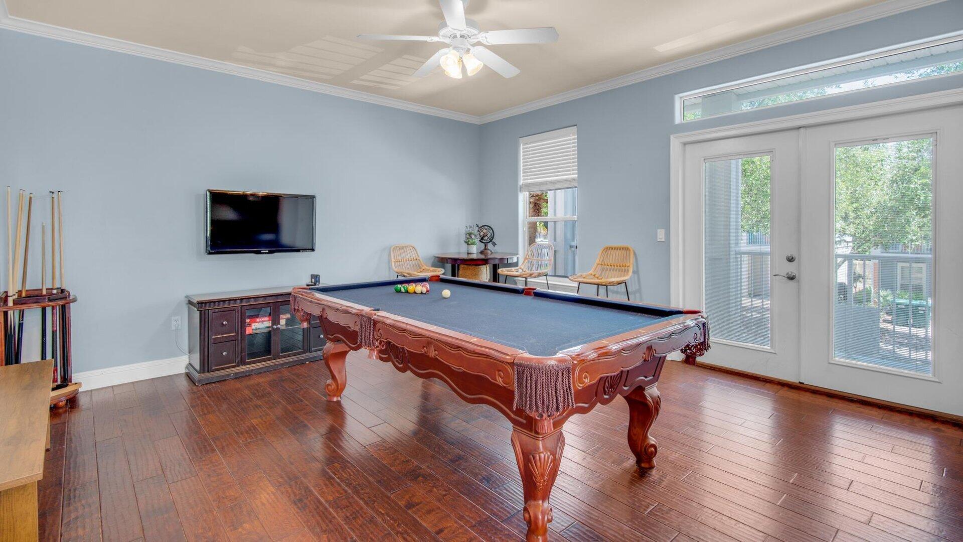 222 Kono Way Destin, FL 32541 - Photo 4 of 36 a room with wooden floors and pool table