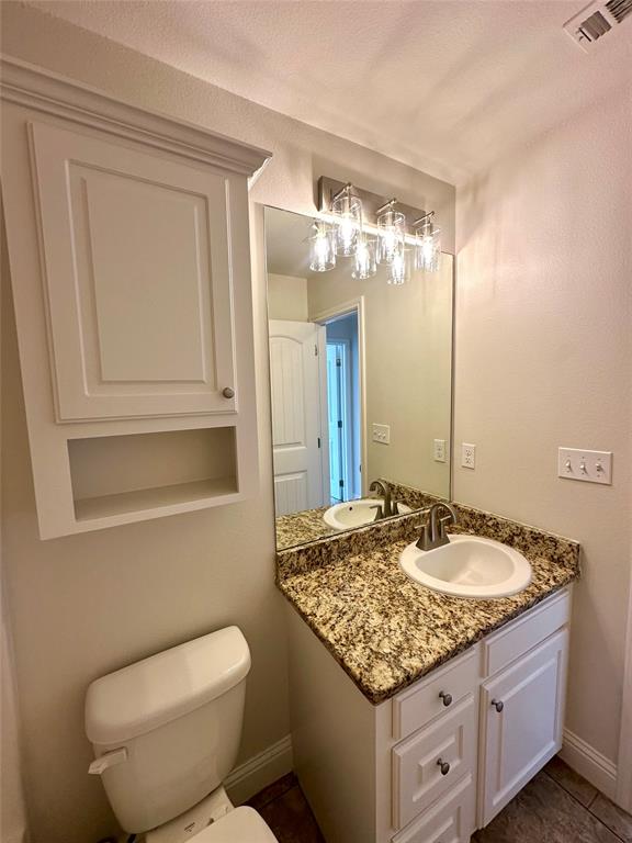 198 Bent Tree Loop Haughton, LA 71037 - Photo 20 of 32 a bathroom with a granite countertop sink and a mirror