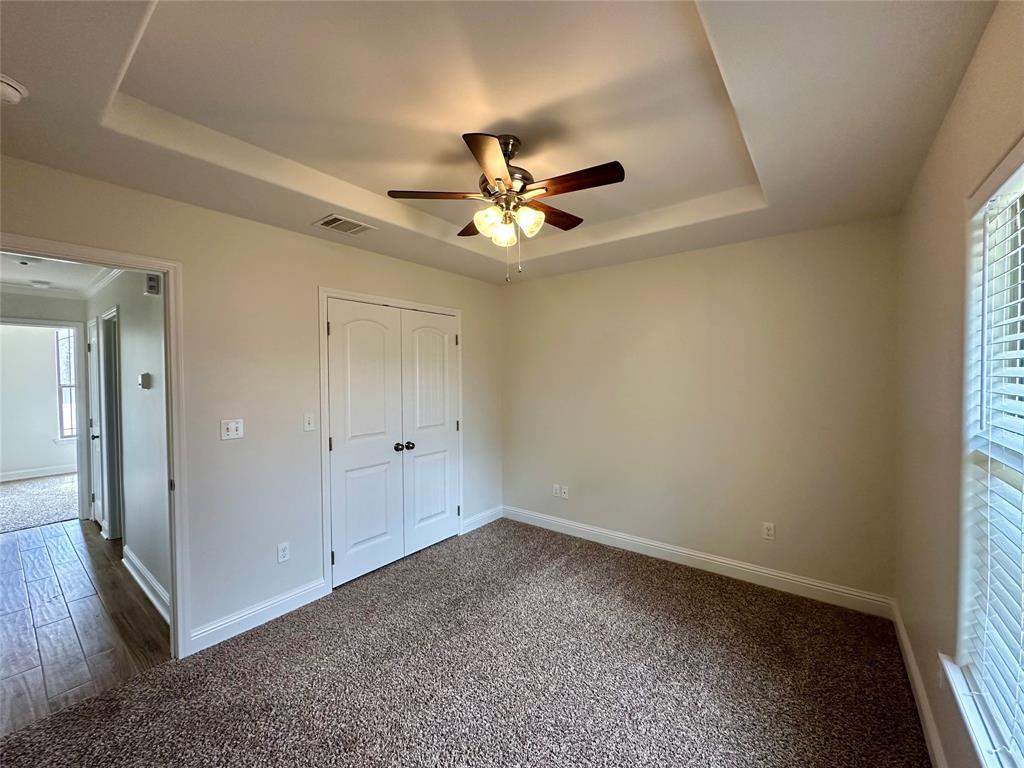 198 Bent Tree Loop Haughton, LA 71037 - Photo 22 of 32 wooden floor in an empty room with a window
