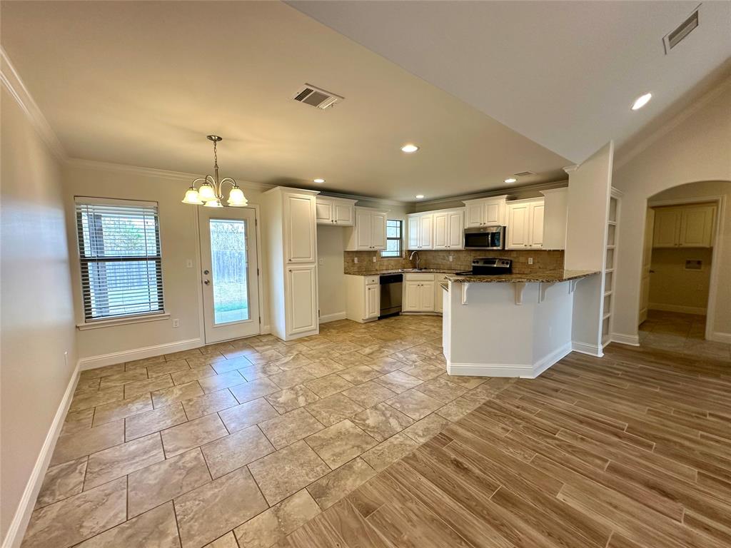 198 Bent Tree Loop Haughton, LA 71037 - Photo 6 of 32 a view of a kitchen with a sink and cabinets
