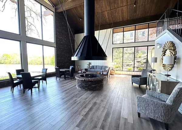 a view of an entryway with wooden floor