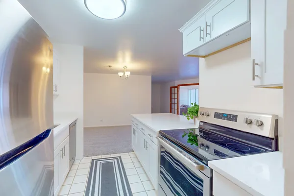 a view of kitchen and utility room