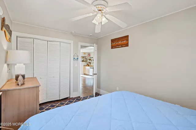 a view of a patio with a table and chairs