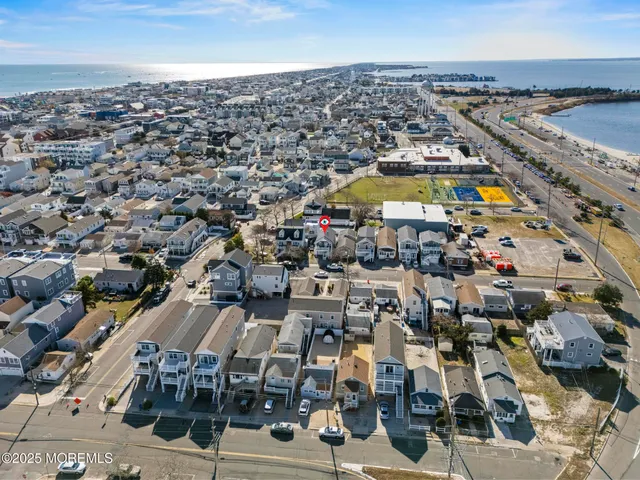 an aerial view of a house with outdoor space