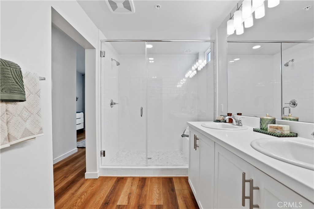 42 Bigsby Drive Stanton, CA 90680 - Photo 38 of 40 a bathroom with a sink and a mirror
