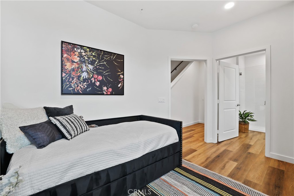 42 Bigsby Drive Stanton, CA 90680 - Photo 4 of 40 a bedroom with a bed and wooden floor