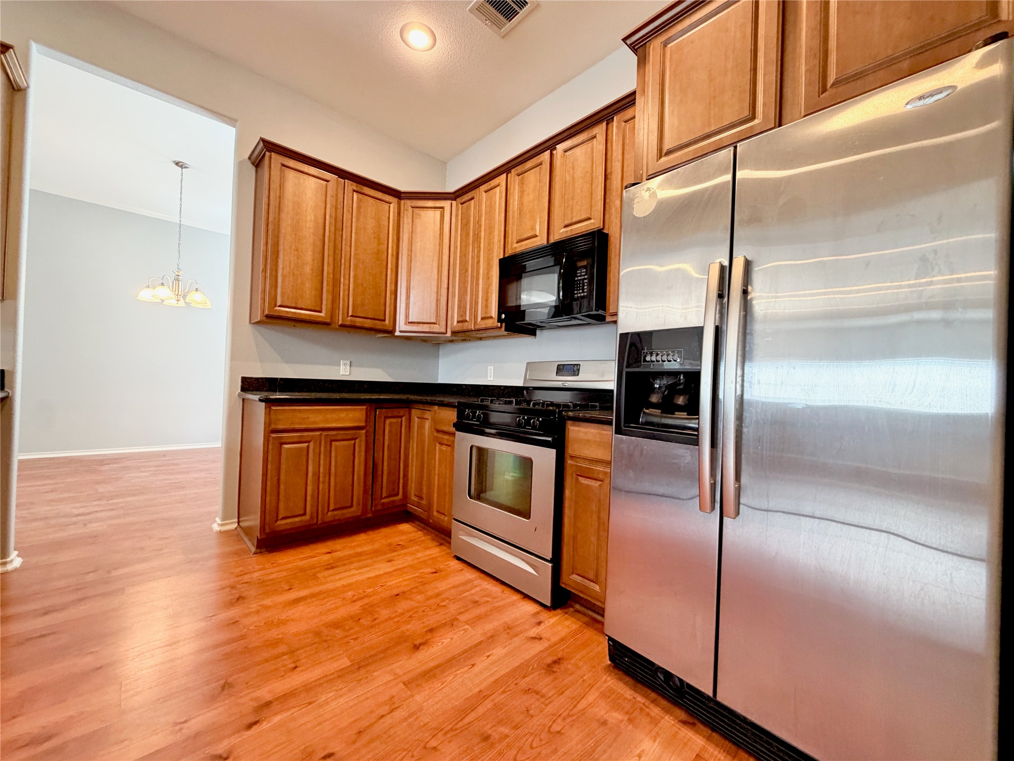 1608 Holman Street Houston, TX 77004 - Photo 17 of 43 Plentiful Cabinetry and stainless steel appliances