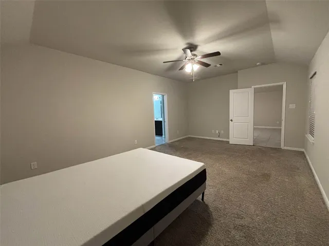 a workspace with chandelier fan