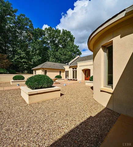 a dining room with a table and chairs