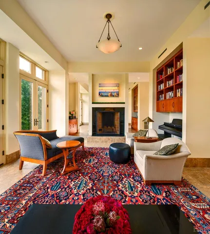 a bath tub sitting in a bathroom next to a toilet