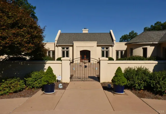 front view of a house with a garden
