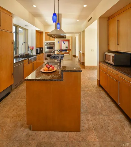 a bed room with a bed and a chair