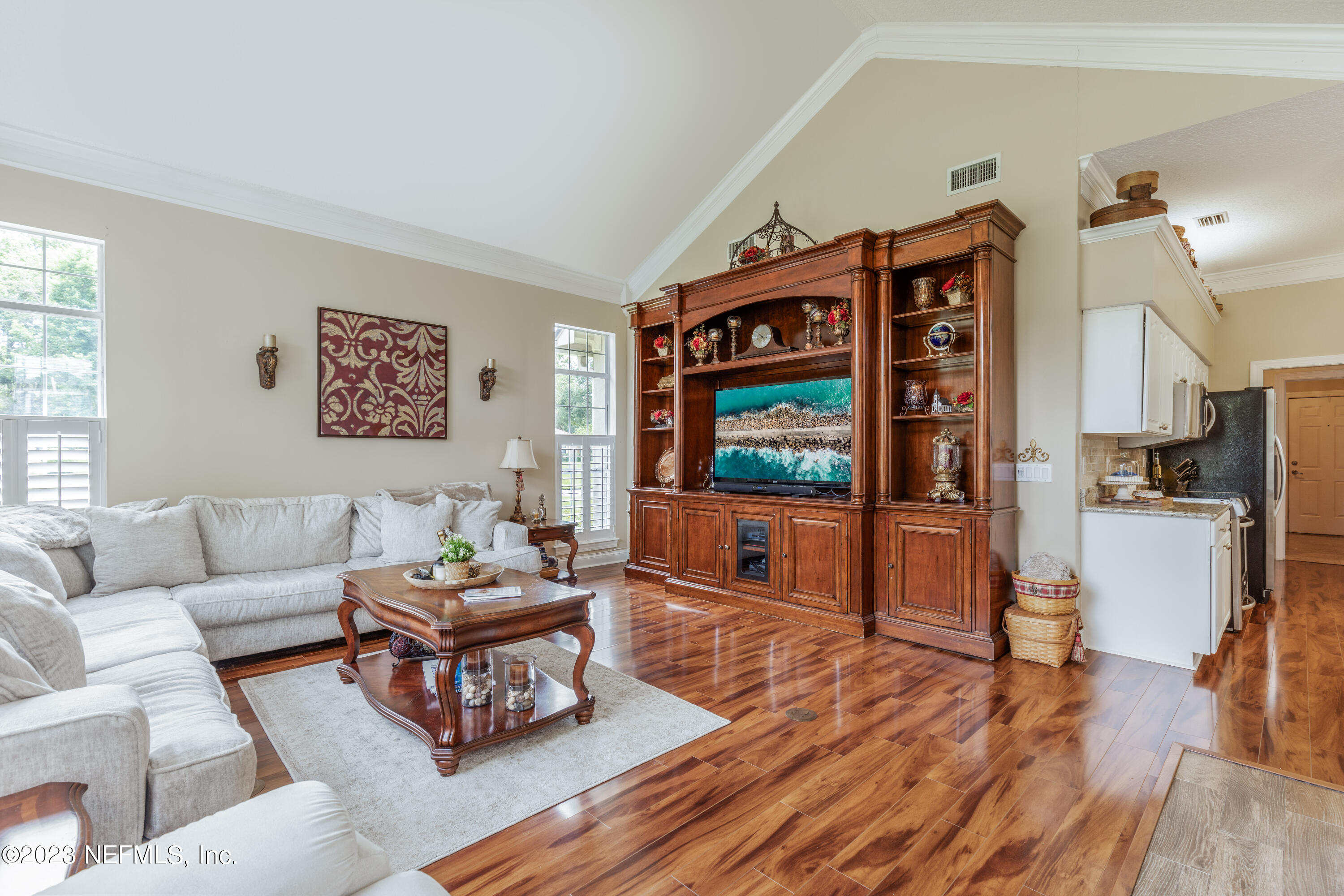 729 Cherry Grove Road Orange Park, FL 32073 - Photo 11 of 47 a living room with furniture and a flat screen tv